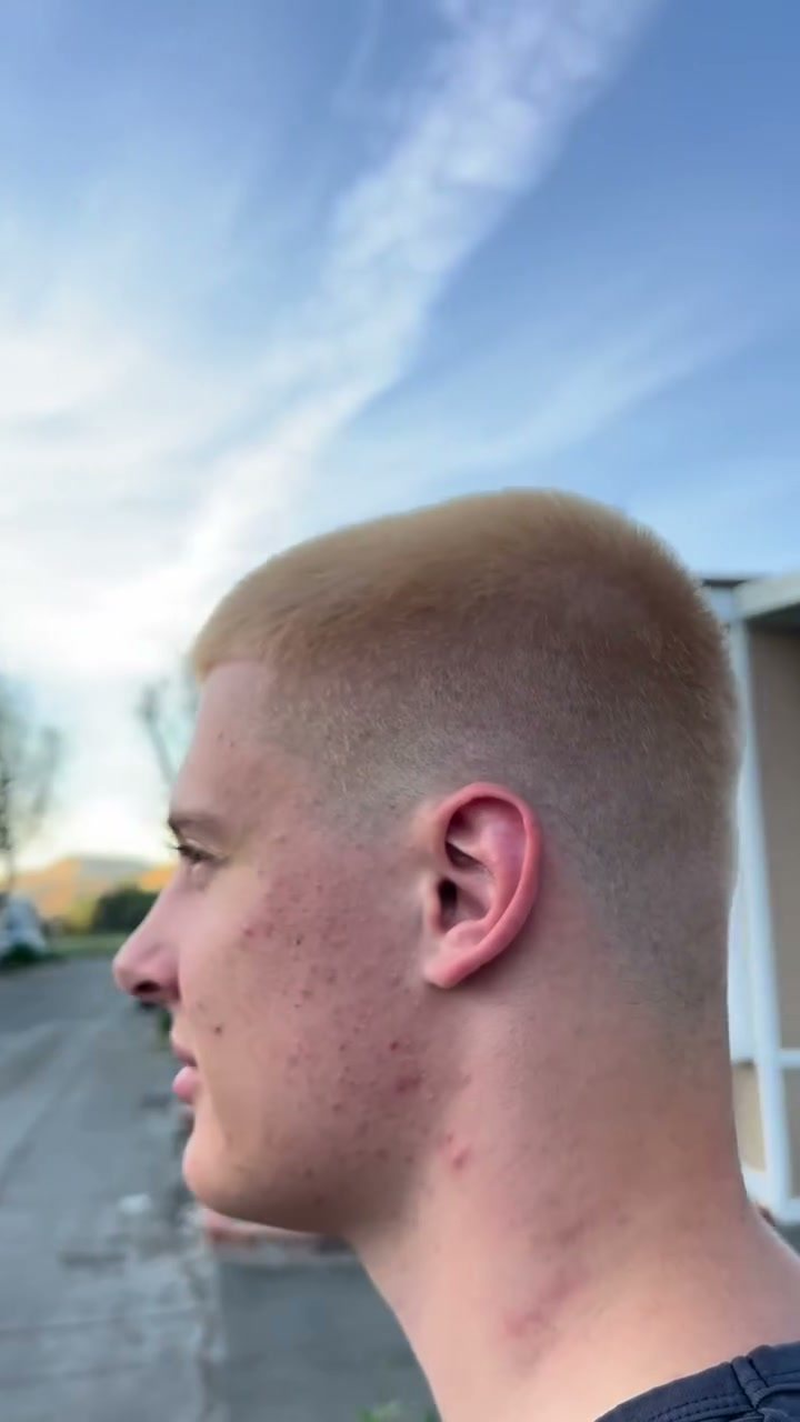Men's short haircut taken blonde