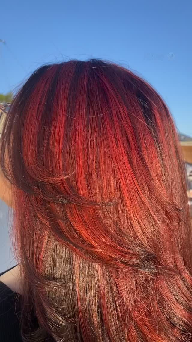 Vivid red chunky highlights, finished after a color correction